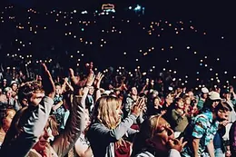 Hands up in the middle of the crowd
