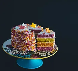 A brightly iced birthday cake