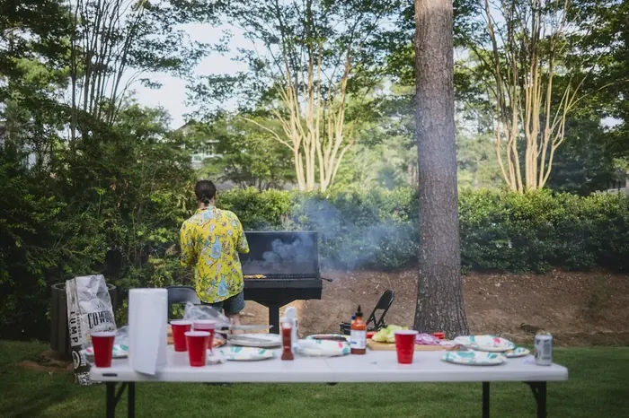 A backyard barbecue at golden hour